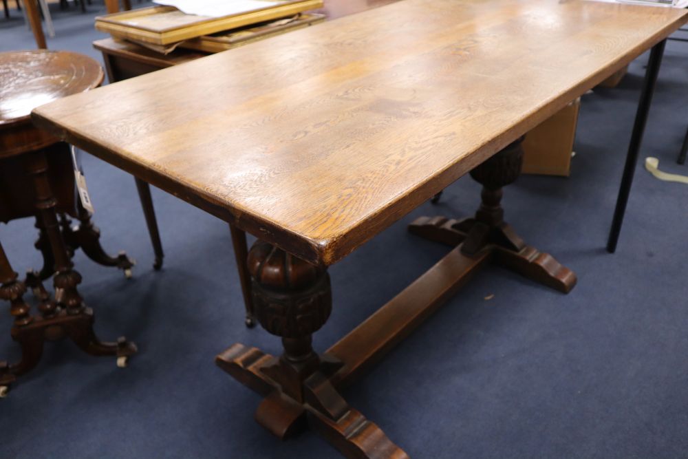 A small 17th century style oak refectory table, 137 x 69cm height 74cm